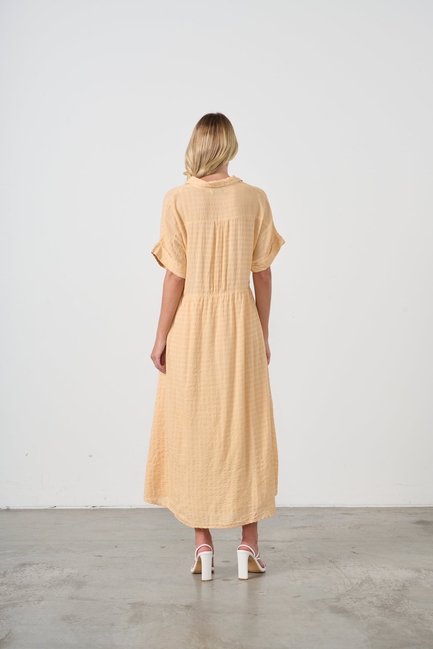 Dress with hidden buttons